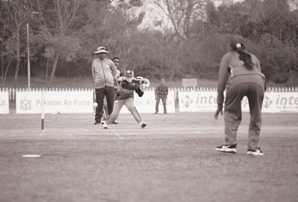 pakistani player batting a bow bowled by nepali player