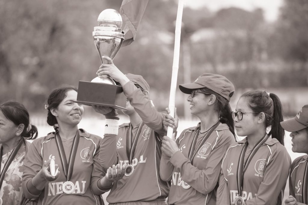 nepali players holding the trophy after winning the tournament