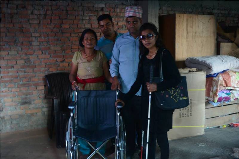 Shristi KC donating wheelchair