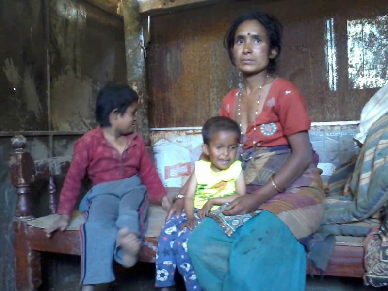 Sirisa and her sister with their mother