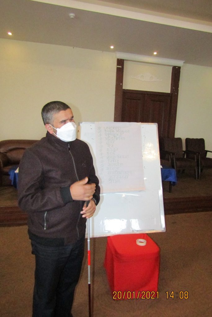 NFDN Gandaki President Mr. Khomraj Sharma explaining Disability words and terminologies as mentioned in the UNCRPD