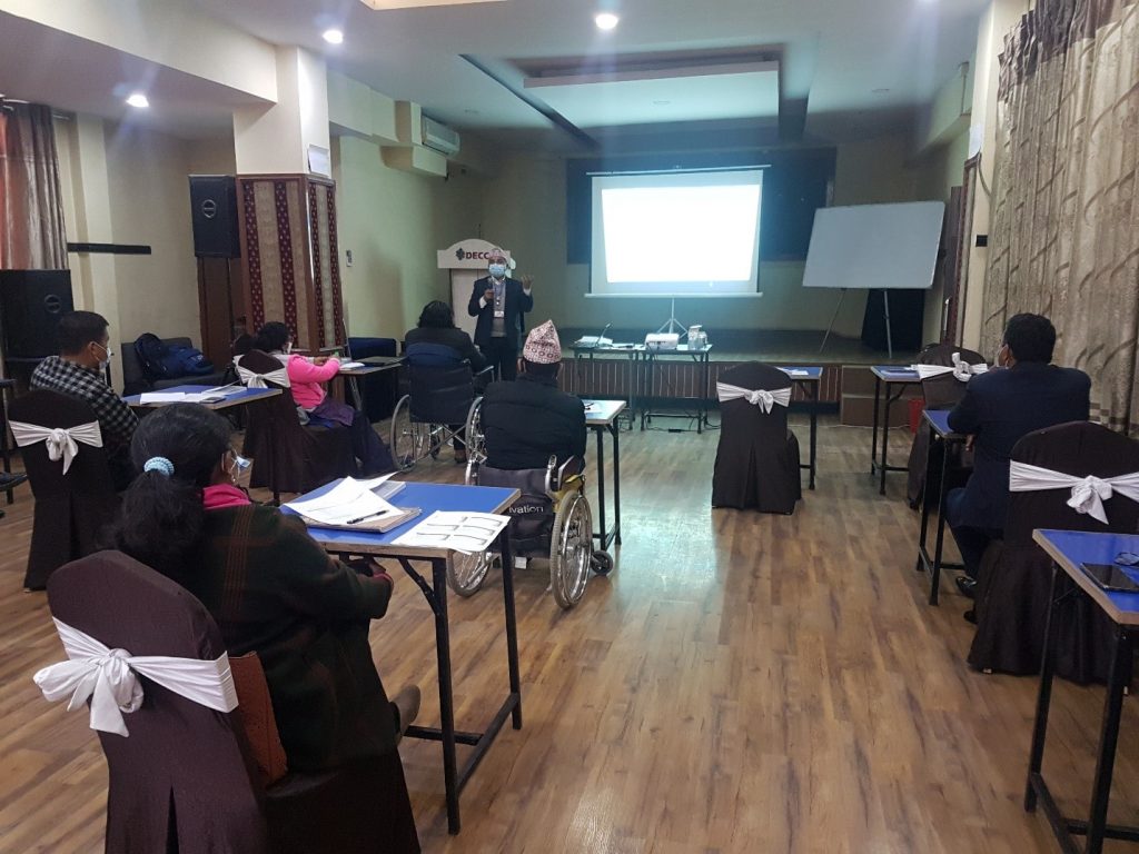 अपाङ्गता तथा पुनर्स्थापना सम्बन्धि चालु आ. ब. २०७७/०७८ को कार्यक्रम र बजेट कार्यन्वयनको अवस्था तथा आगामि आ. ब. २०७८/०७९ को योजनाका बारेमा छलफल गर्दै कुष्ठरोग नियन्त्रण तथा अपाङ्गता ब्यबस्थापन शाखा (LCDMS) का प्रमुख डा. माधव लम्साल 