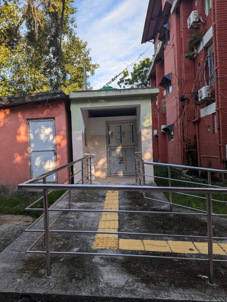 Picture showing ramp and tactile toilet