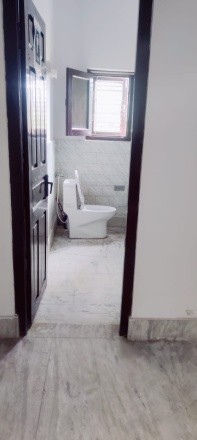 Showing ramp and commode toilet